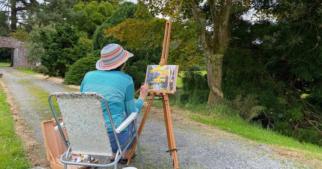 Somebody painting outdoors