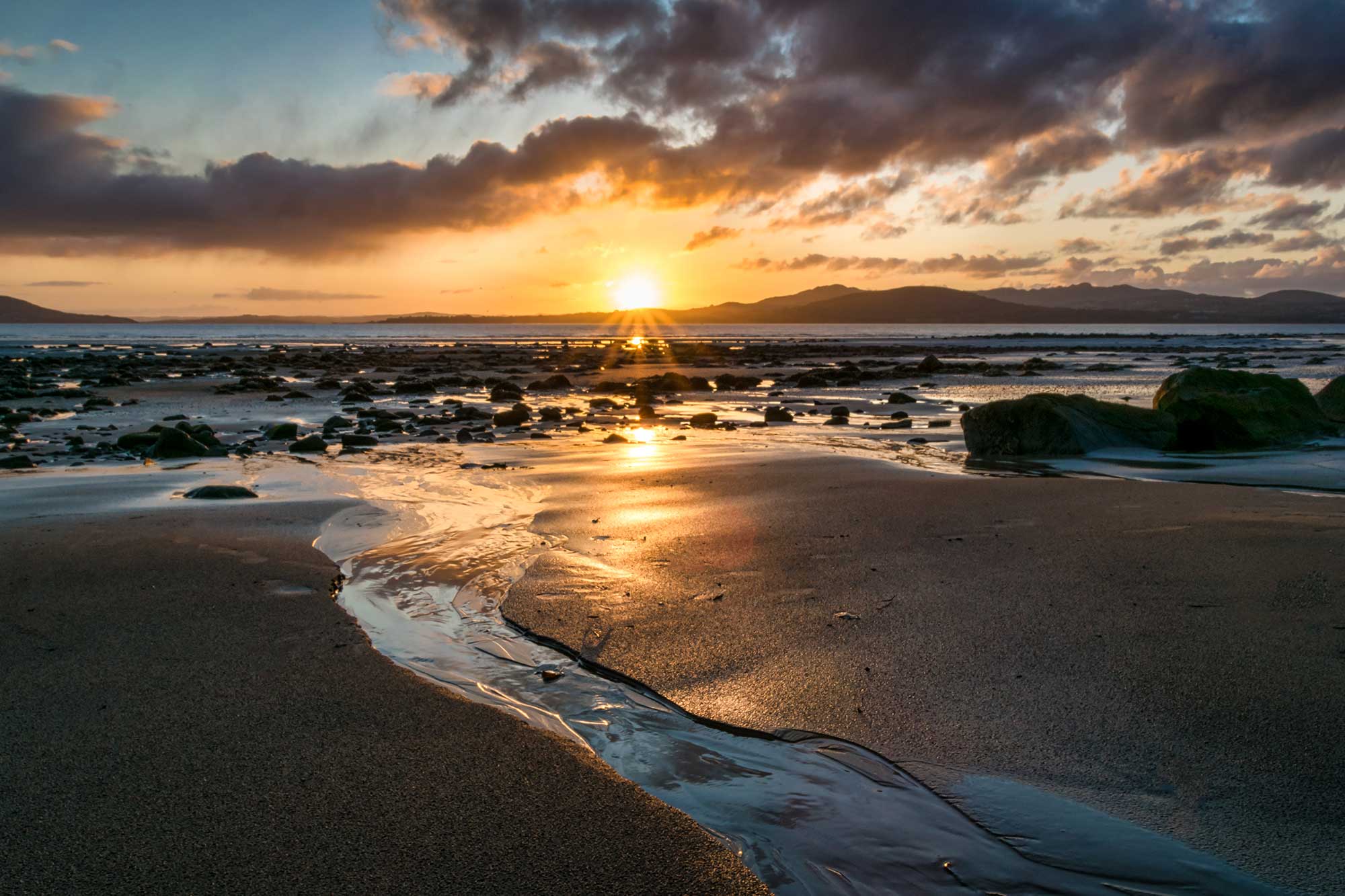 A beach in Buncrana, Inishowen, County Donegal at sunset