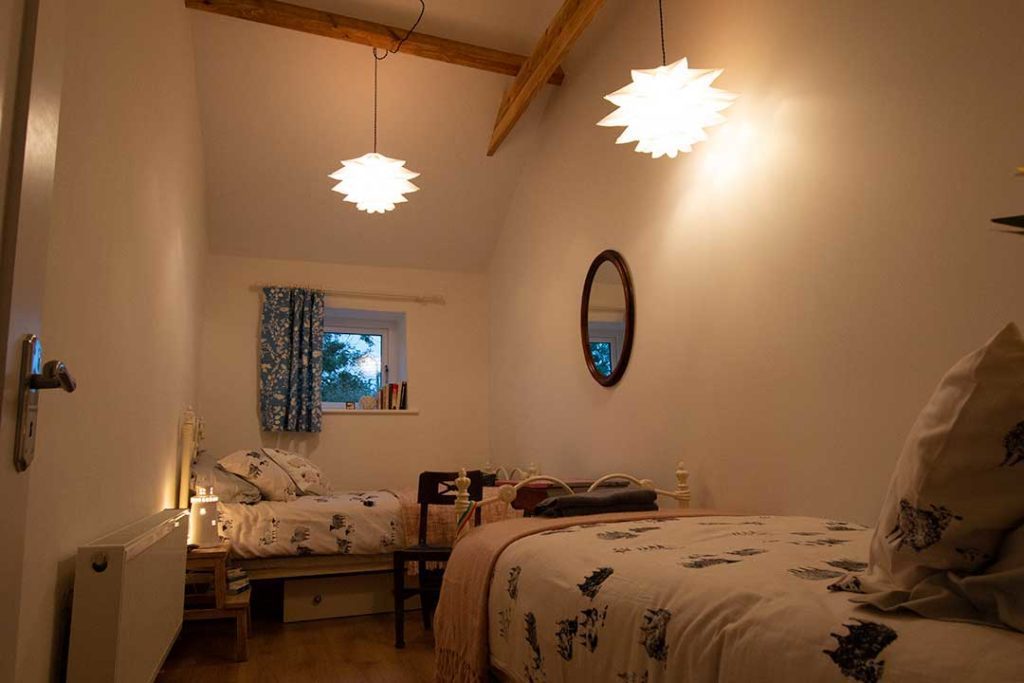 The long bedroom ready for guests