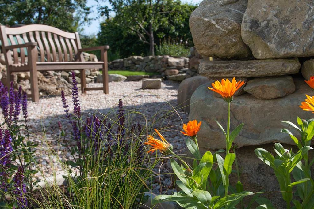 An outdoor seating area in the garden