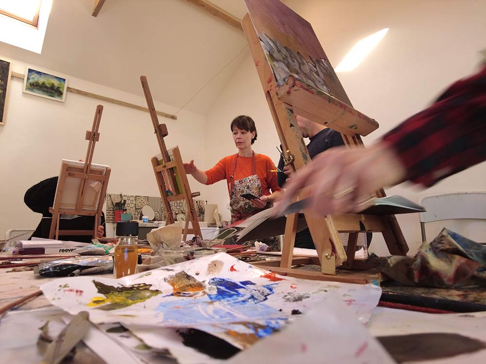 People painting in an art studio